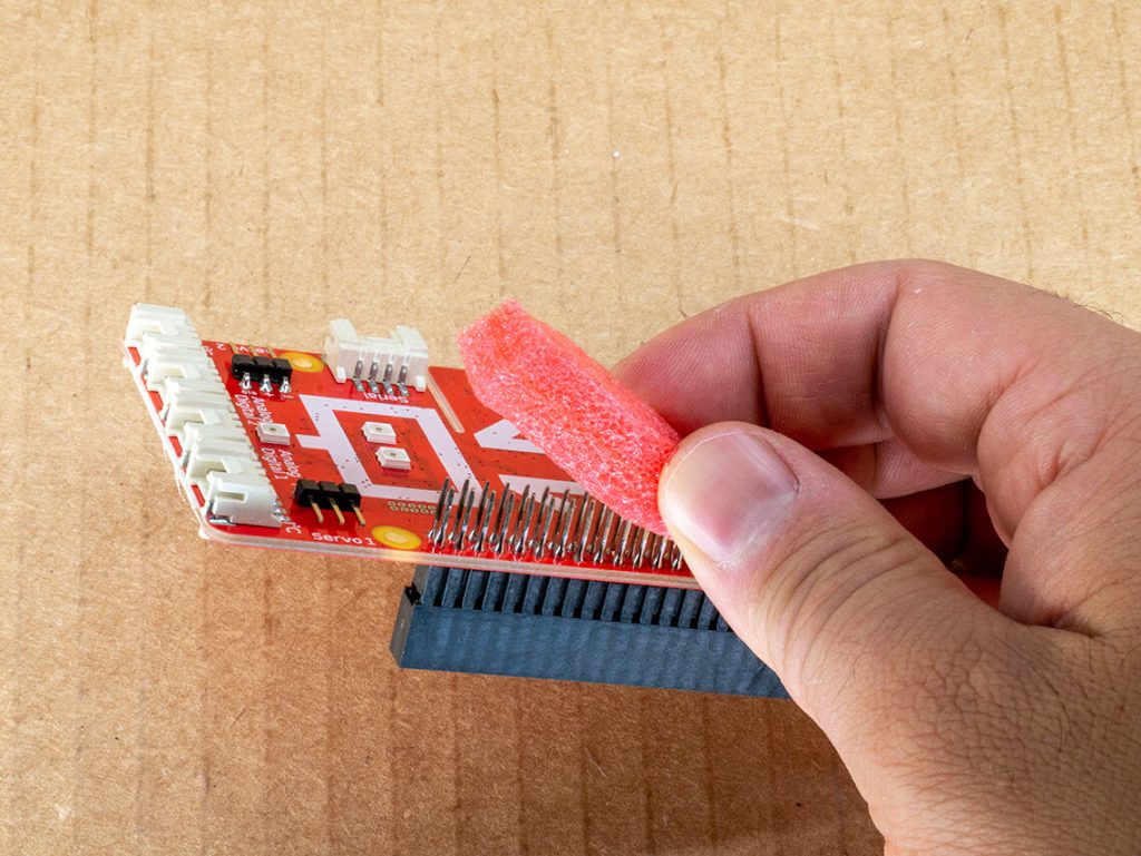 Remove foam from the GoPiGo red electronic board.